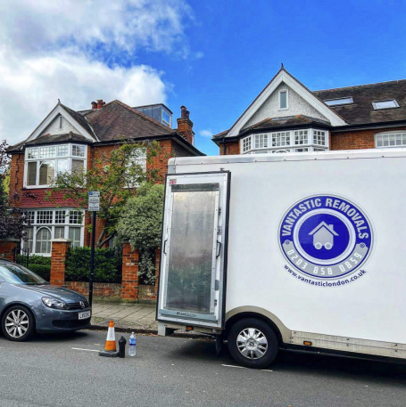 Vantastic Removals van parked in front of a spacious Chiswick residence, gearing up for a comprehensive move.