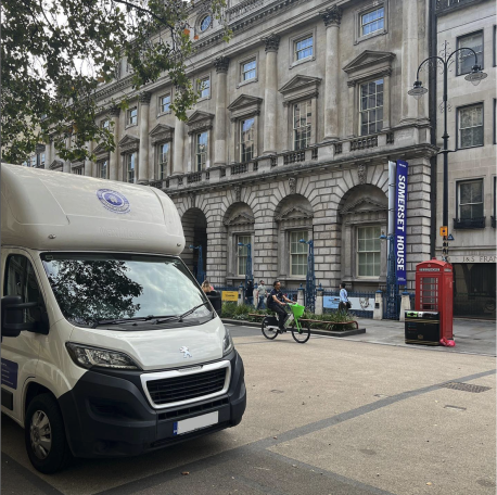 Vantastic Removals orchestrating an office move outside Somerset House, London.